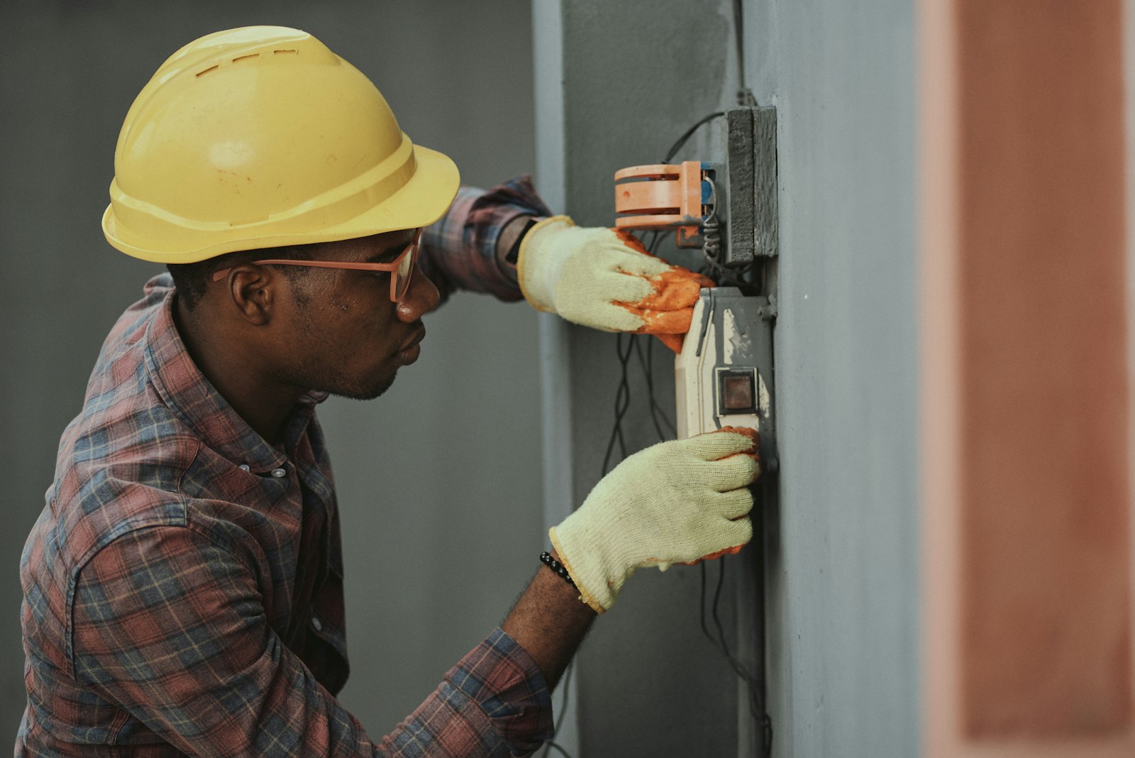 Electrician working on a panel